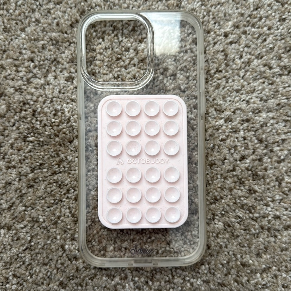 Clear Sonix iPhone 14 pro max case with pink octobuddy attached